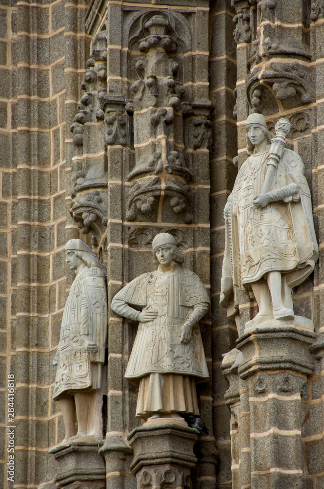 Spain, Castilla-La Mancha,Toledo. Statues on exterior church walls.