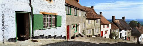 England, Gold Hill. Elevated above the Dorset countryside, Shaftsbury's famous Gold Hill provides a idyllic picture of English countrylife. photo