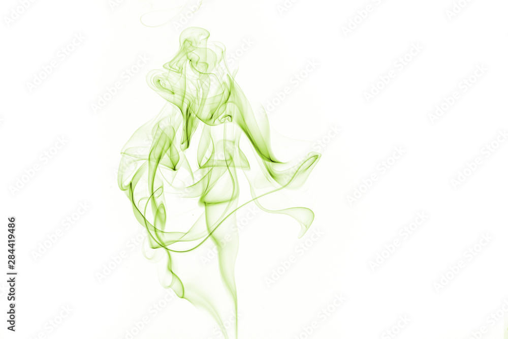 Fototapeta premium Green smoke on white background.