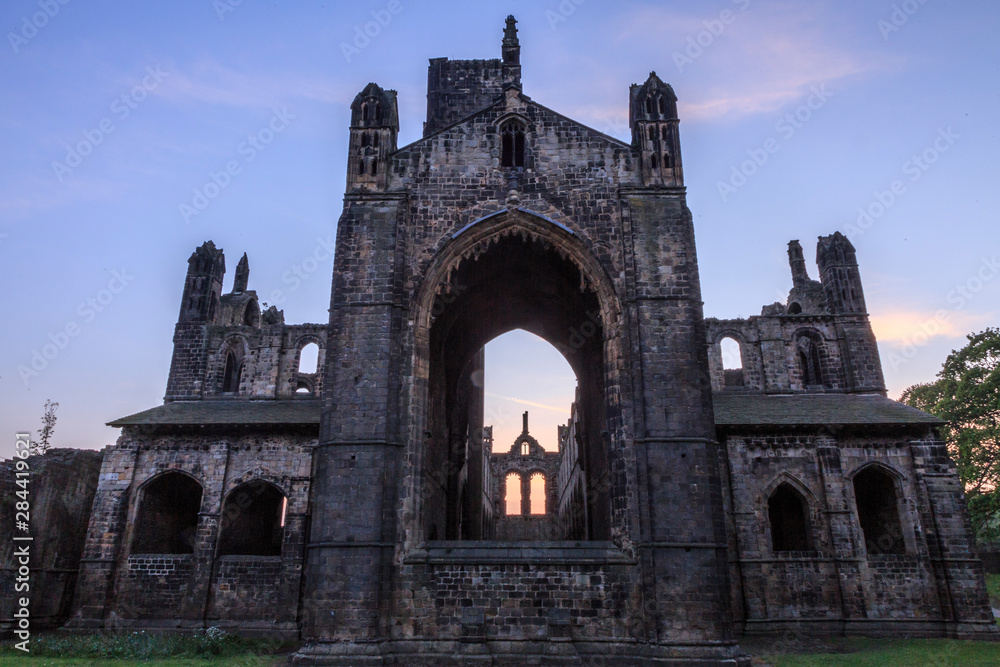Obraz premium United Kingdom, Great Britain, England, West Yorkshire, Leeds, North Bank of River Aire. Kirkstall Abbey, 12th century Cistercian Monastery ruins.
