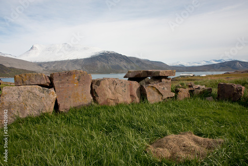 Greenland, Tunulliarfik (aka Erik's Fjord), Itelleq (aka Igaliku) near Brattahlid. Historic Erik the Red's Eastern Settlement & ruins of Gardar, religious heart of 12th c. Norse Greenland.. photo
