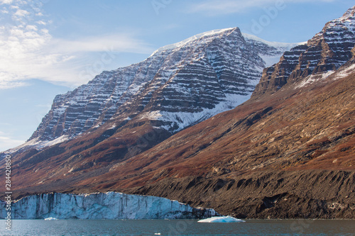 Greenland. Scoresby Sund. Gasefjord. Lateral moraine and face of a glacier. photo