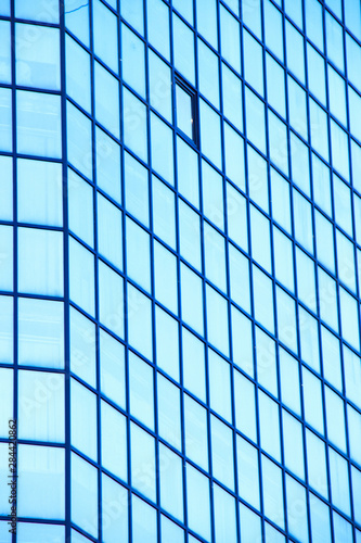 Wallpaper Mural A high-rise office building with blue glass windows Torontodigital.ca