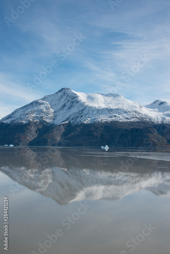 Greenland, Tunulliarfik (aka Erik's Fjord), near Brattahlid. Scenic fjord with icebergs and fresh Fall snow on mountain tops..