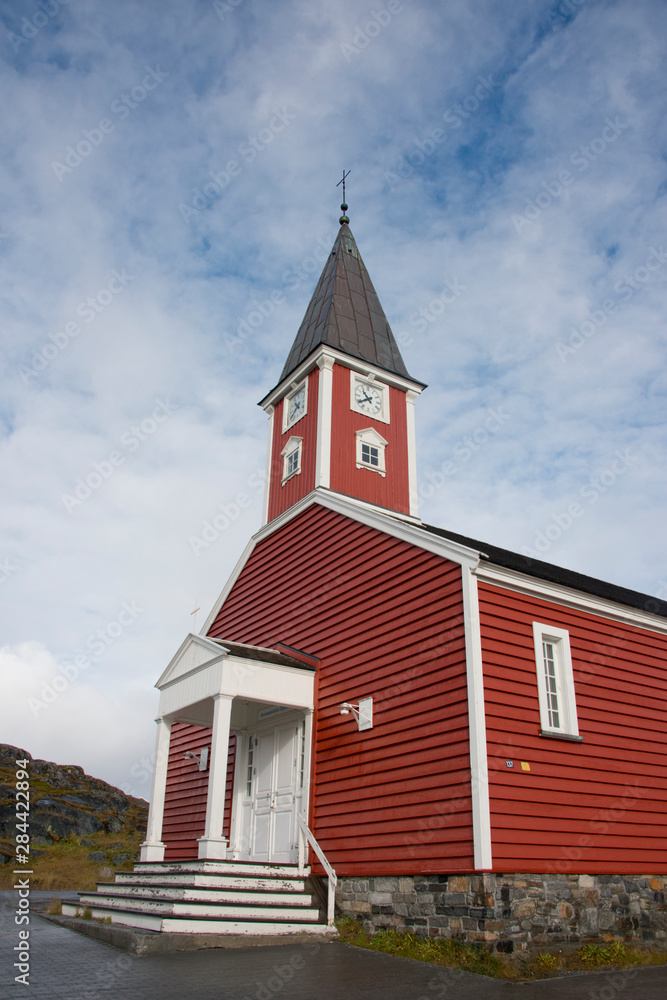 Greenland, Nuuk (or Godthab). Nuuk is the capital of Greenland and the country's largest city with a population of about 15,800. Historic district, Our Saviors' Church.. Greenland, Nuuk (or Godthab). Nuuk is the capital of Greenland and the country's largest city with a population of about 15,800. Historic district, Our Saviors' Church..