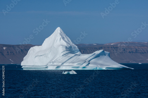 Greenland, Scoresbysund, aka Scoresby Sund. Large icebergs near Ittoqqortoormiit. photo