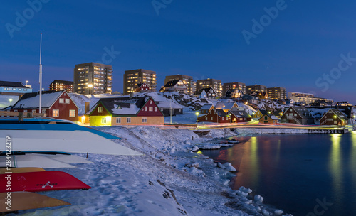 View over the old town and the colonial harbour towards the modern quarters of Nuuk, capital of Greenland. photo