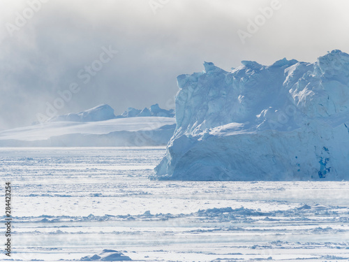 Ilulissat Icefjord also called kangia or Ilulissat Kangerlua at Disko Bay. The icefjord is listed as UNESCO World Heritage Site. Greenland, Denmark.