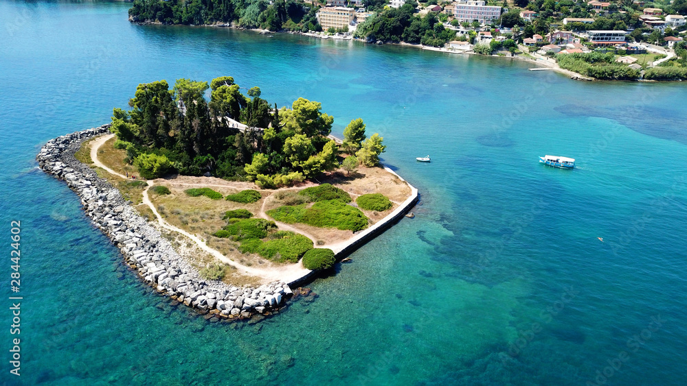 Fototapeta premium Aerial drone bird's eye view photo of iconic small island of Pontikonisi or Mouse island in area of Kanoni, Corfu island, Ionian, Greece