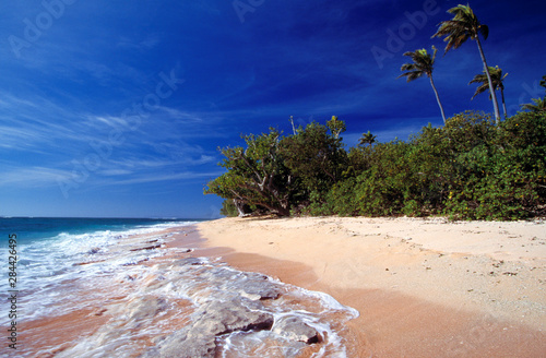 Fiji Islands, Tavarua. This beach on Tavarua, in the Fiji Islands, wouldn't be a bad place to while away an afternoon. photo