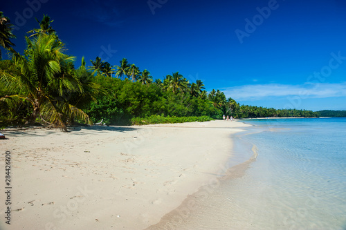 Fototapeta Naklejka Na Ścianę i Meble -  White sand beach and turquoise water at the Nanuya Lailai Island, Blue Lagoon, Yasawa, Fiji, South Pacific
