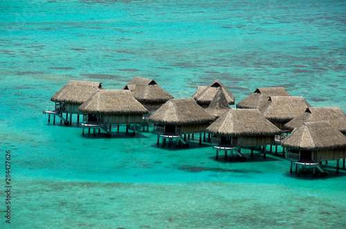 South Pacific, French Polynesia, Moorea. Popular over the water bungalows.