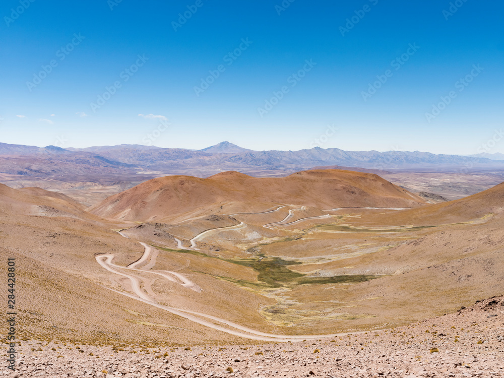 Routa 40 climbing up to Abra del Acay (4895m), one of the highest regular roads in the world. The Altiplano in Argentina. Routa 40 climbing up to Abra del Acay (4895m), one of the highest regular roads in the world. The Altiplano in Argentina.