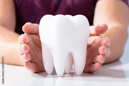 Hands Protecting Healthy Hygienic White Tooth