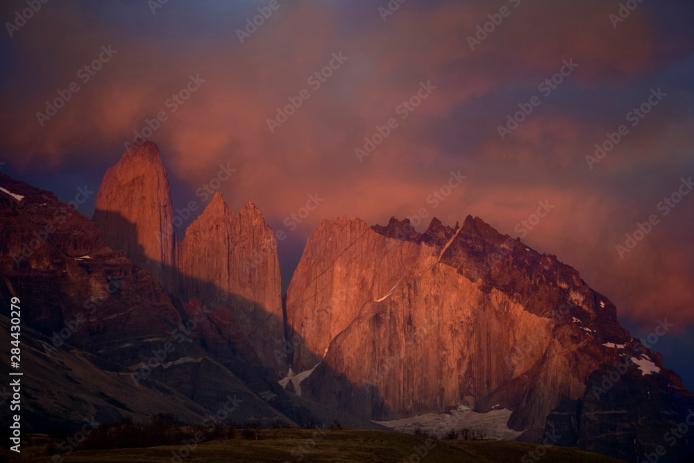 Chile, Torres del Paine National Park. Morning alpenglow illumines granite towers. 