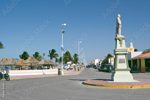 North America, Mexico, Yucatan, Progresso. This is the west end of the main waterfront street of Progresso with the Malecon on the left. A monument to Adolfo Lopez Mateos is at the right. photo