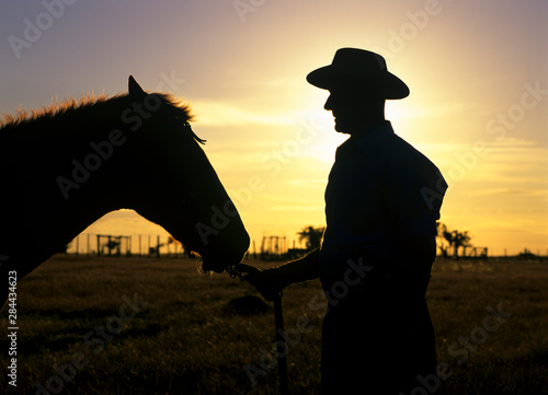 Φωτογραφία Uruguay, Florida, An authentic gaucho and his horse on a working ranch