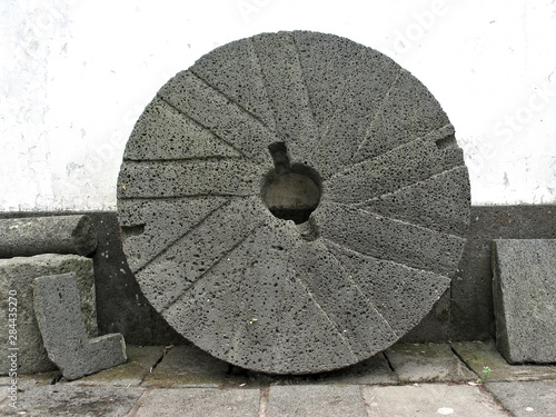 Fotografia, Obraz Millstone element of a gristmill for grinding wheat or other grains