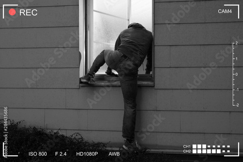 Photography Burglar Entering House Through Window