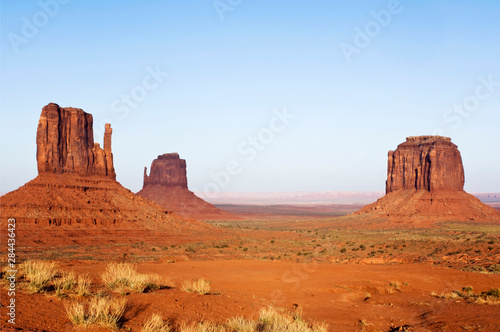 USA, AZ, Navajo Reservation, Merrick Butte and the Mittens in Monument Valley Tribal Park at Sunset