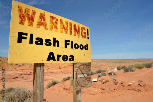 USA, Arizona, Navajo Nation, Antelope Canyon, Hasdestwazi. Warning! Flash Flood Area sign at Lower Antelope Canyon