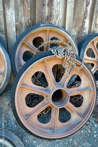 USA, Arizona, Jerome, Gold King Mine. Selection of rusted wheels with solid rubber tires