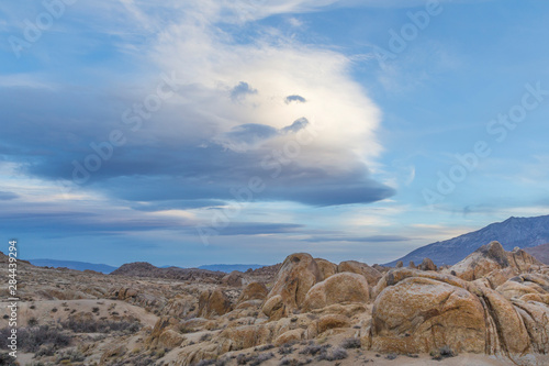 USA, California, Sierra Nevada Mountains. Clouds over the Alabama Hills. Cred...