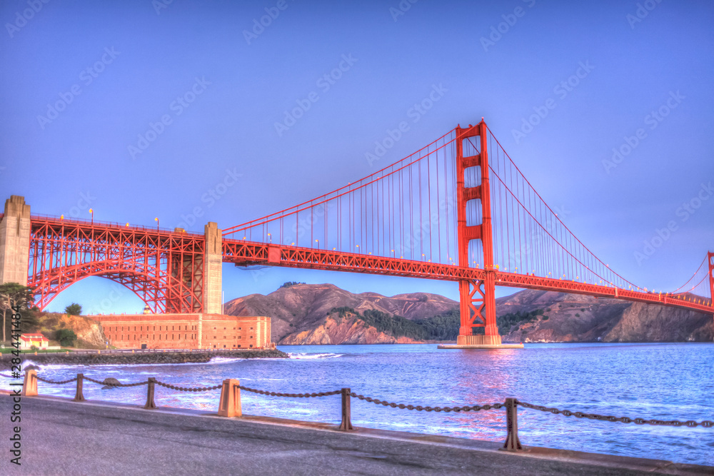 Fototapeta premium San Francisco Golden Gate Bridge from For Point Wharf at sunrise, San Francisco, California, USA