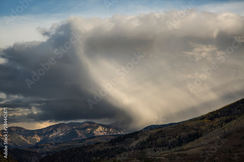 USA, Colorado, Sneffels Range. Wave-shaped storm over mountain. 