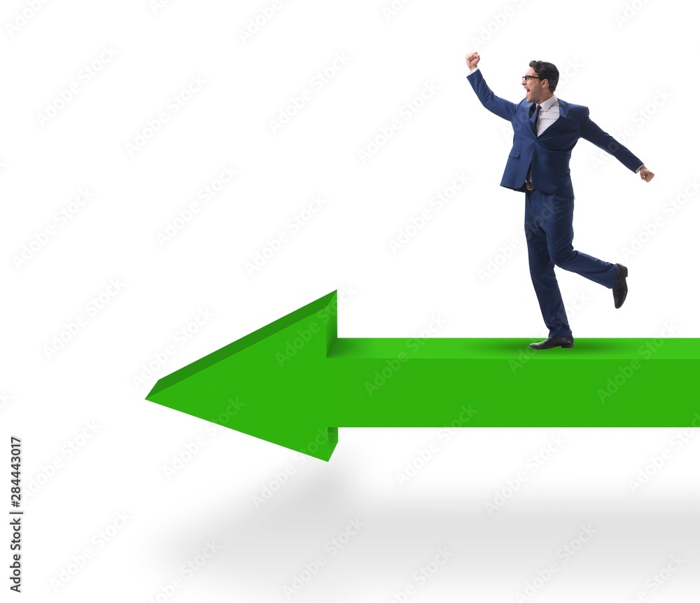 Businessman walking on arrow isolated on white background Businessman walking on arrow isolated on white background