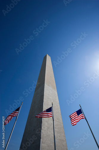 USA, Washington, D.C. American flags at the Washington Monument. 
