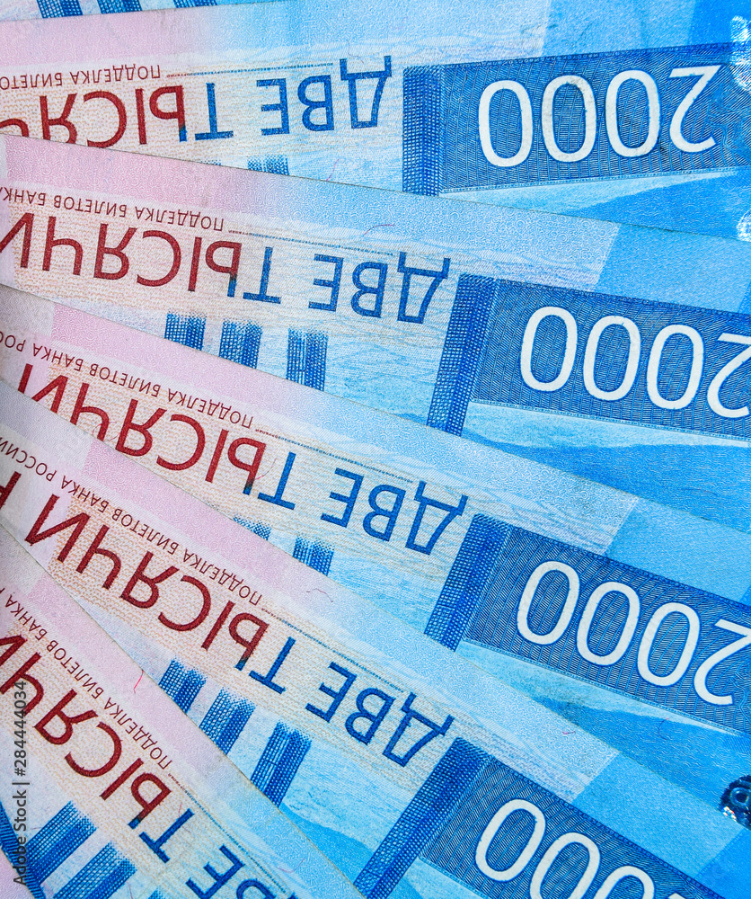 Obraz premium Russian money banknotes in nominal value of two thousand. New tickets of the bank of Russia. Russian money.