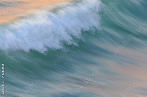Fototapeta Naklejka Na Ścianę i Meble -  Pacific Ocean wave patterns after sunset, Pacific Beach, San Diego, California, USA