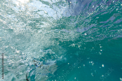 Fisheye view of wave breaks at Kua Beach, North of Kona, Big Island, Hawaii