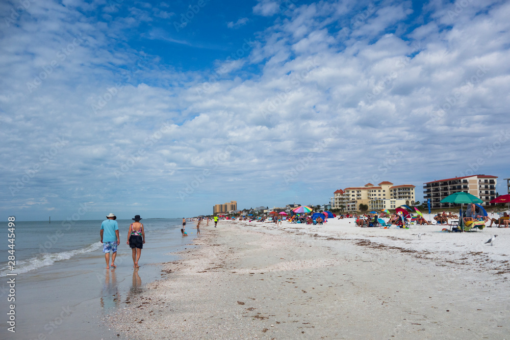 Tourists and people walking on Clearwater Beach, Florida Tourists and people walking on Clearwater Beach, Florida