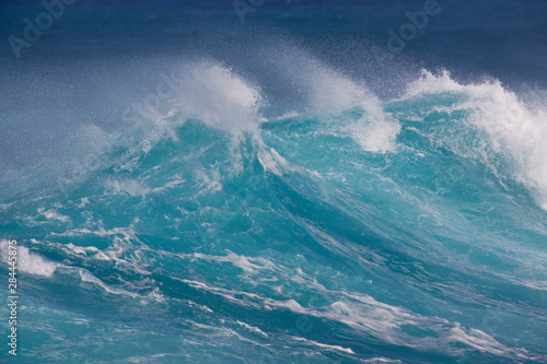 Waves cresting along Hookipa beach state park, Maui, Hawaii