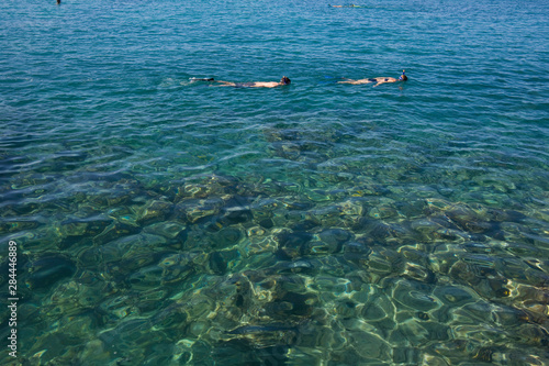 USA, Hawaii, Big Island, Kona, Kona Village, Snorklers  © Rob Casey/Danita Delimont