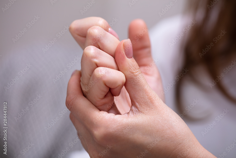 Woman Cracking Their Knuckles Woman Cracking Their Knuckles
