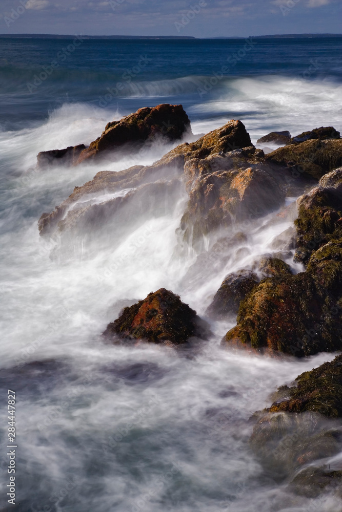 Long exposure of wave crashing against rocky coastline, Acadia National Park, Maine