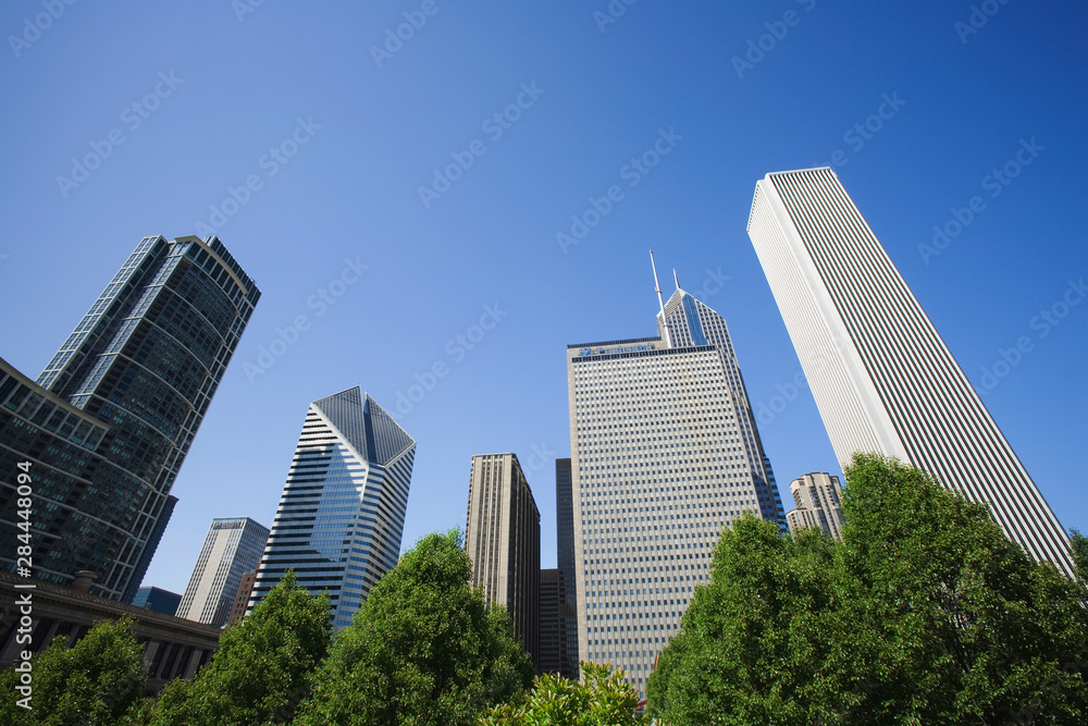 USA, Illinois, Chicago. Skyscrapers and trees. USA, Illinois, Chicago. Skyscrapers and trees.