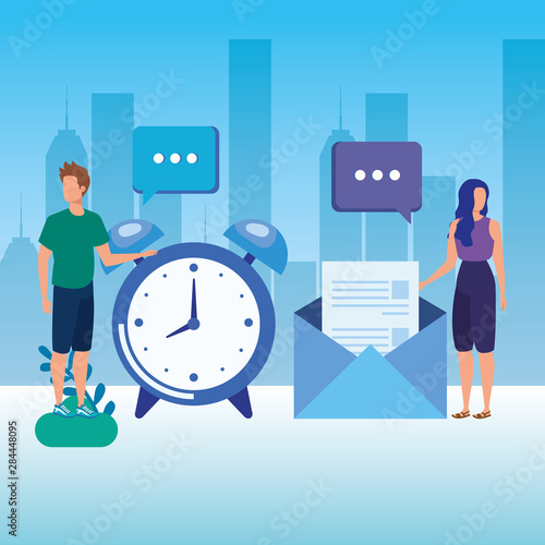 young couple with alarm clock