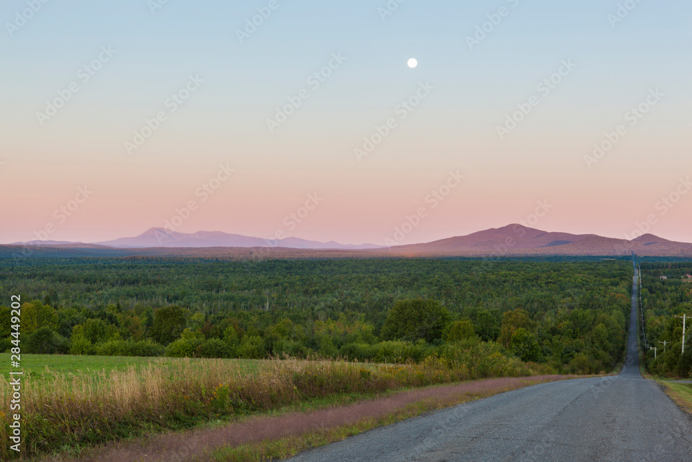 The moon over Mount Katahdin as seen from Townline Road (part of the International Appalachian Trail) in Merrill, Maine (near Smyrna Mills.)