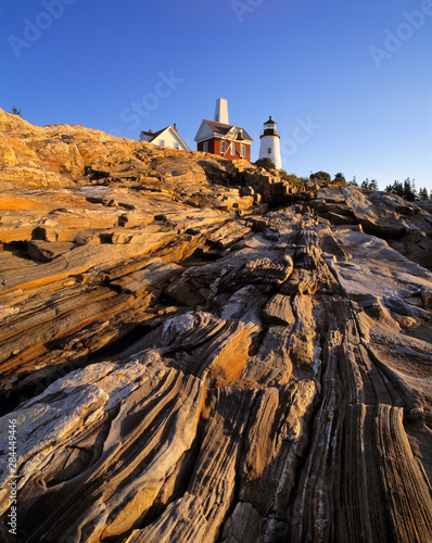 USA, Maine, Pemaquid Light. The striated, carved rocks near the Pemaquid Lighthouse in Maine, are a tribute to the power of nature.