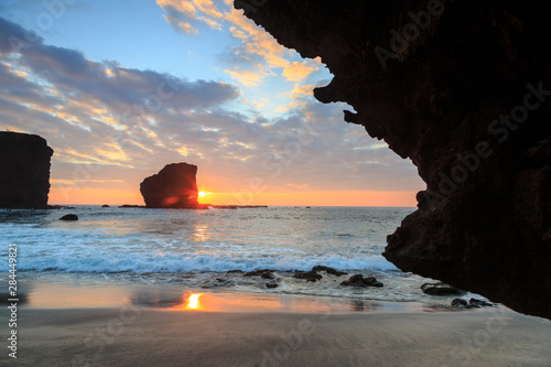 View from beach at Manele Bay of Puu Pehe (Sweetheart Rock) at sunrise, South Shore of Lanai Island, Hawaii, USA