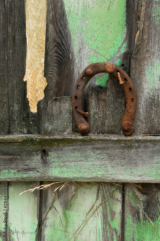USA, Montana. Rusty horseshoe on old fence. Credit as: Nancy Rotenberg / Jaynes Gallery / DanitaDelimont.com USA, Montana. Rusty horseshoe on old fence. Credit as: Nancy Rotenberg / Jaynes Gallery / DanitaDelimont.com