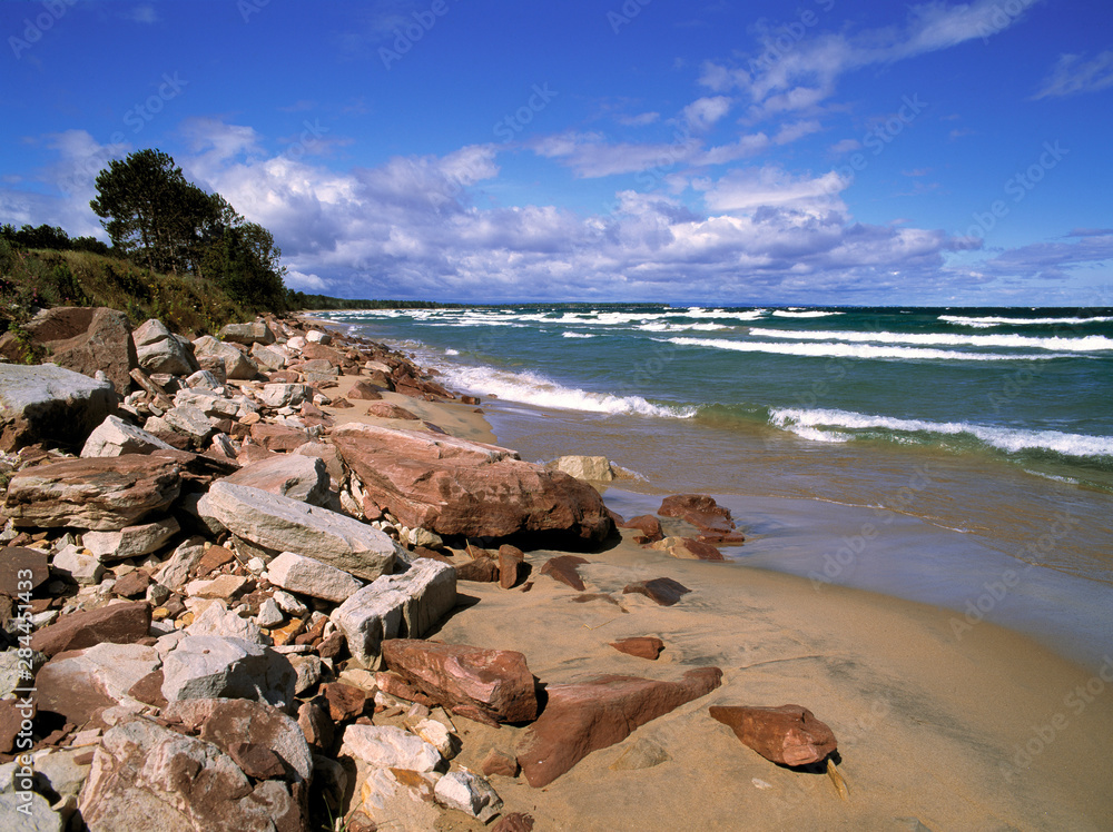 USA, Michigan, Pictured Rocks NL. Waves rush the smooth, sandy shoreline of Lake Superior at Pictured Rocks National Lakeshore, Michigan.