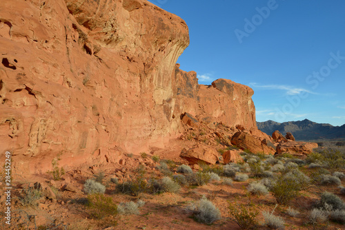 USA, Nevada. Valley of Fire State Park. Sandstone cliffs above a wash