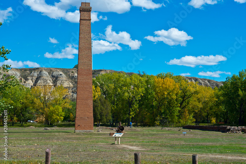 USA, North Dakota, Medora. Chateau DeMores State Historic Site, Packing Plant Ruins, Chimney Park photo