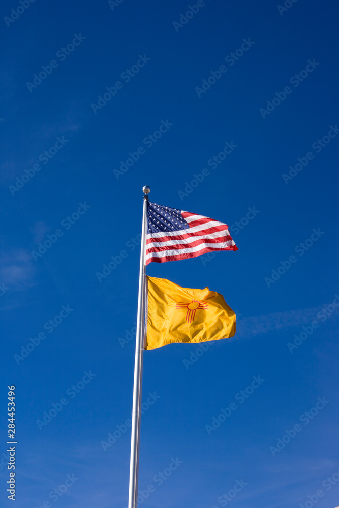 NA, USA, New Mexico, Santa Fe, New Mexican and US Flag 