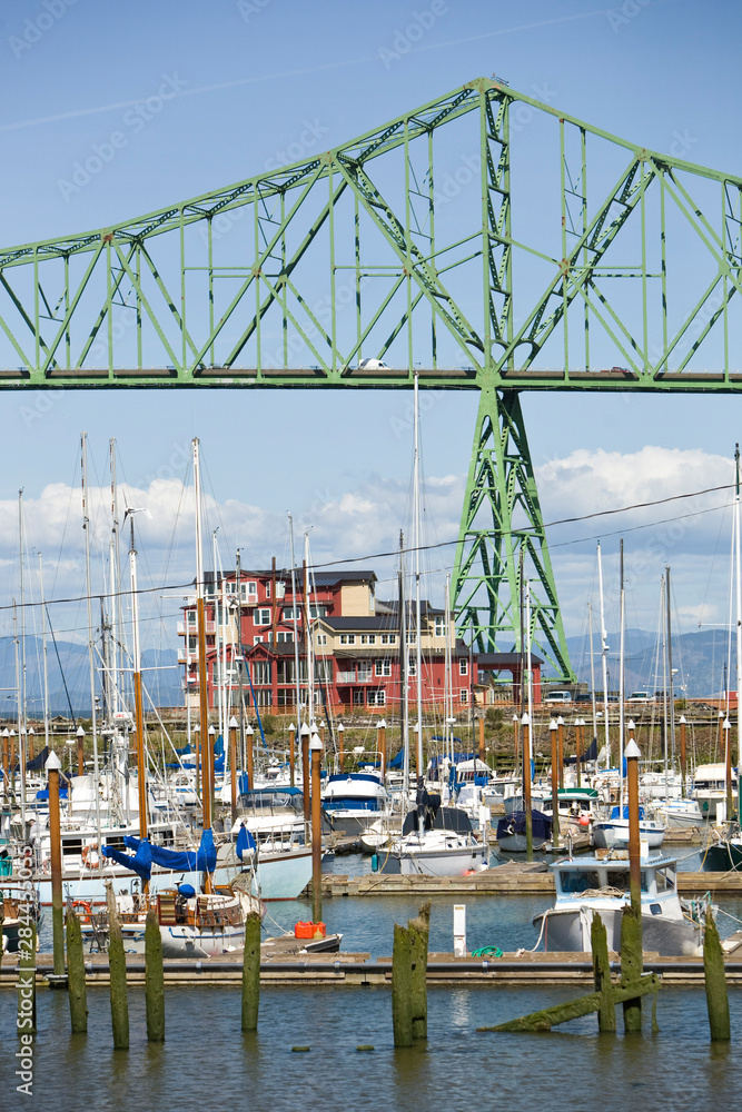 View of marina and historic Astoria Bridge on the Columbia River. Astoria, Oregon